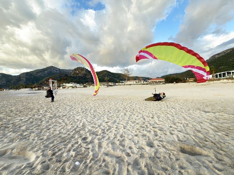 Pilots laying out wings on Belcekız beach