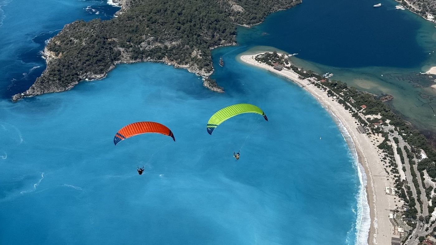 Paragliders over the Ölüdeniz lagoon and Belcekız beach